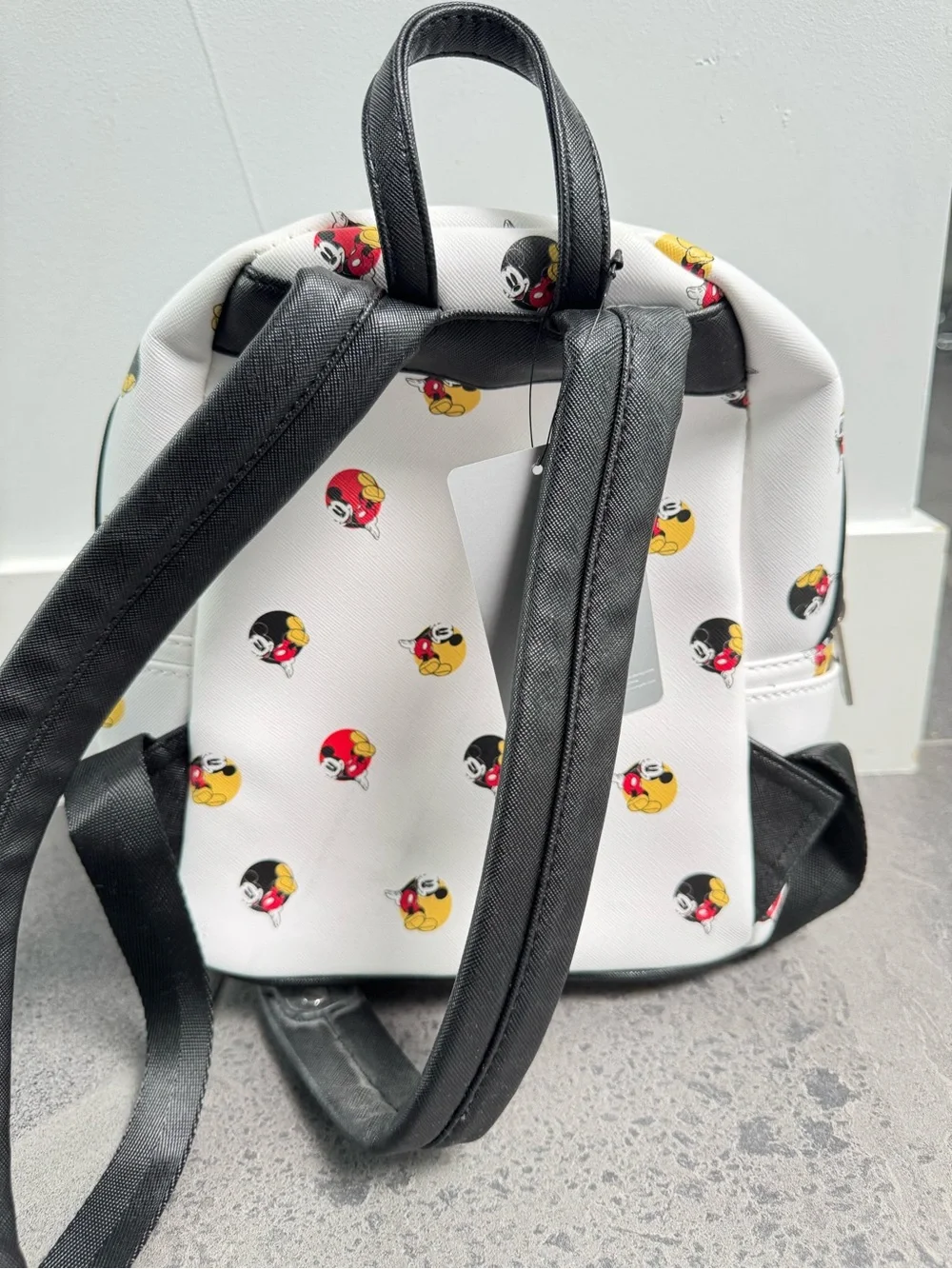 Loungefly Disney White Mini Backpack with Red and Yellow Mickey Icons